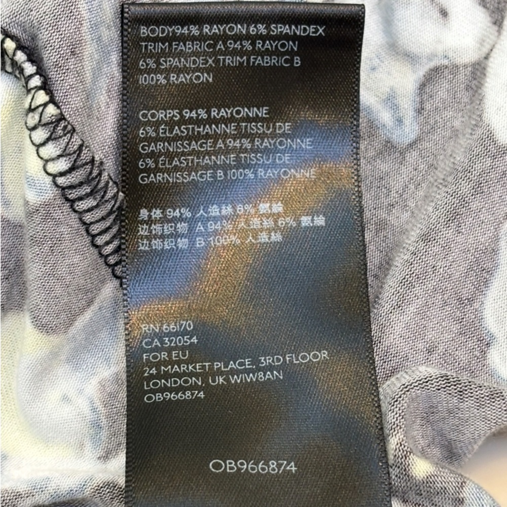 Free People “Baja Babe Cold Shoulder” top in black floral combo, size L 🖤 - Picture 13 of 13